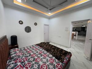 RS Nest Farms 4BHK Villa with Pool by Homeyhuts
