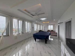 RS Nest Farms 4BHK Villa with Pool by Homeyhuts