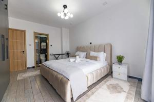 Comfort living three bedroom apartment with fully equipped gym swimming pool private parking space ,child play area and amazing scenic views