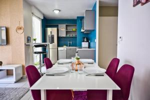 Appartements Le Golden - Centre Ville - Acces Transports en Commun - Balcon Cosy - Commerces a Proximite : photos des chambres