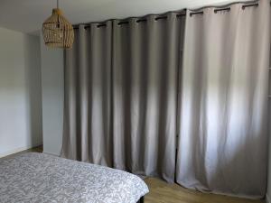 Appartements Au jardin des pies : photos des chambres