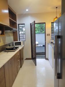 US 150 daily for furnished HOUSE and brand new CAR in Exclusive Neighborhood