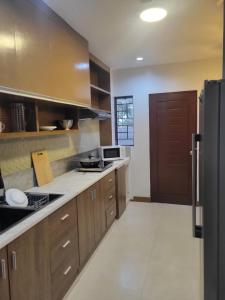 US 150 daily for furnished HOUSE and brand new CAR in Exclusive Neighborhood