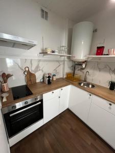 Appartements Cosy, Centre de Rosendael, HomyNest : photos des chambres