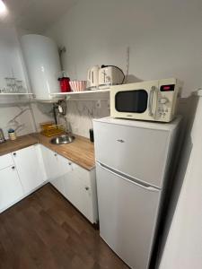 Appartements Cosy, Centre de Rosendael, HomyNest : photos des chambres