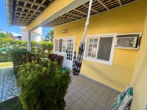 Casa pé na areia em condomínio