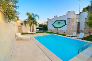 Villa Nadia con Piscina nel Boomerang Village a Torre Colimena