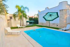 Villa Nadia con Piscina nel Boomerang Village a Torre Colimena