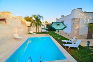 Villa Nadia con Piscina nel Boomerang Village a Torre Colimena