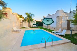 Villa Nadia con Piscina nel Boomerang Village a Torre Colimena