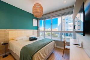 Apto retrô na Praia de Palmas - 0184