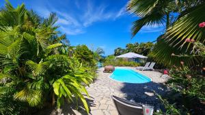 Bungalow Maracuja avec piscine, vue mer, plage à 150m