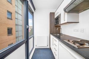 Modern City Studio w Desk and TV