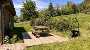 Chalets Chalet avec bain nordique et sauna : photos des chambres