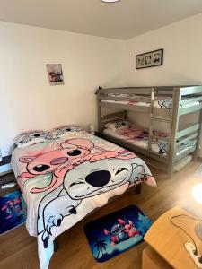 Appartements appartement 5min gare RER Disneyland Paris val d'Europe la vallee Village parking inclus : photos des chambres