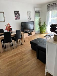 Appartements appartement 5min gare RER Disneyland Paris val d'Europe la vallee Village parking inclus : photos des chambres