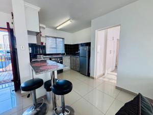 Tranquil Shores Modern 1BR WiFi Pool Beach