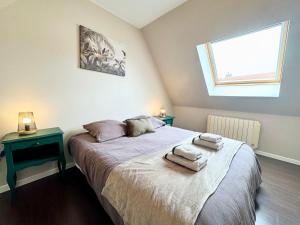 Appartements La Fleur Bleue - Cozy Apartment : photos des chambres