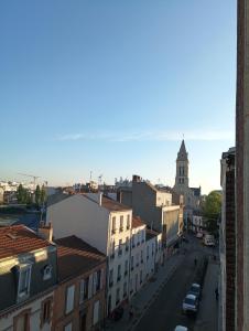 Sejours chez l'habitant flowers room au coeur de saint Ouen parking gratuit : Chambre Double