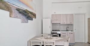 Podilimbo - Ilios e Thalassa