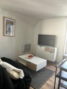Appartements Apartment La Fontaine : photos des chambres