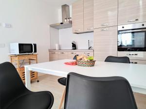 Appartamento Aurora in Valtellina - Accogliente alloggio tra lago e montagna