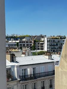 B&B / Chambres d'hotes Appartement Paris 16e Passy Tour Eiffel : photos des chambres