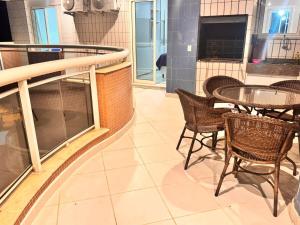 Riviera de São Lourenço, pé na grama