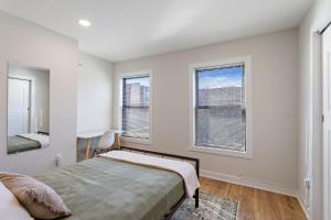 Welcome to The Lux Collective a Spacious 5-Bedroom House close to Stadiums, Universities, Center City & more!