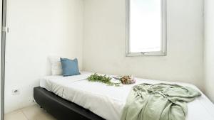 Best Price 3BR at Bassura City Cipinang Apartment By Travelio