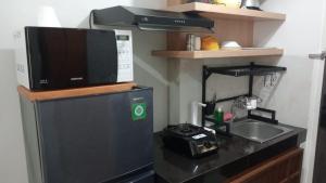 FREE WIFI, NETFLIX, SMART TV, MINERAL WATER, AMENITIES - Studio with Foldable Wall Bed at Serpong Garden Apt