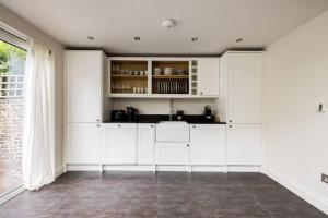 The North Kensington Cottage By Hok Living