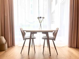 Premium 2 bedroom central home with ground floor terrace and a personal little cinema