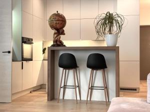 Premium 2 bedroom central home with ground floor terrace and a personal little cinema