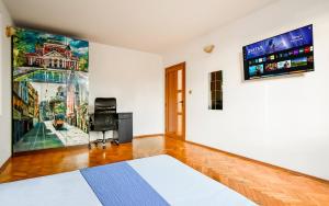 Spacious 3BR in the Center - Kitchen Smart TVs