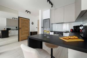 Atmospheric Apartment in Szczecin with a Charming Balcony from Noclegi Renters