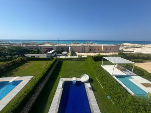 4 bedroom twin villa in Caesar Bay El Sahel , Ras El Hekma
