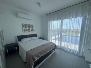 4 bedroom twin villa in Caesar Bay El Sahel , Ras El Hekma