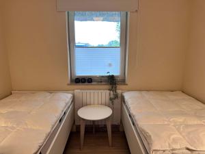 Sky & Sand Homes Oceans Drift I Wohnung unter Reet mit Terrasse am Ordinger Strand