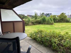 Sky & Sand Homes Oceans Drift I Wohnung unter Reet mit Terrasse am Ordinger Strand