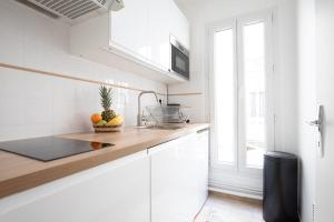 Appartements BnBNova - Jardin du Luxembourg & Pantheon : photos des chambres