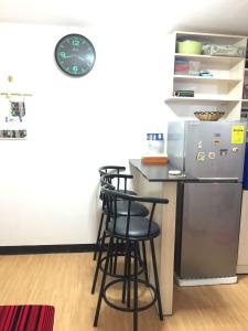 Minimalist Room in Imus Condo with netflix and round-clock Security