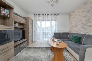 Modern Apartment with a Balcony in a Quiet Estate by Noclegi Renters