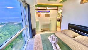 Stunning view staycation near MOA PICC WORLD TRADE CENTER AIRPORT LUNETA PARK MANILA OCEAN PARK QURINO GRANDSTAND