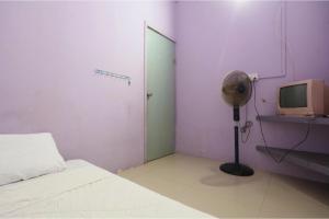 SPOT ON 93276 Fendi 2 Homestay SyariahNearPelabuhan Feri Batam Centre
