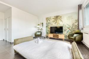 Appartements Escale-marne fr - 001 - RDC - Private Terrace - Free Parking - Free Luggage Storage - Metro 8 Eiffel Tower -All equipped - Linen Included - Washing Machine - Dish Washer - Luxury Mattress 160X200 - Panoramic View - From 1 to 4 guests : photos des chambres