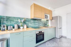 Appartements Escale-marne fr - 001 - RDC - Private Terrace - Free Parking - Free Luggage Storage - Metro 8 Eiffel Tower -All equipped - Linen Included - Washing Machine - Dish Washer - Luxury Mattress 160X200 - Panoramic View - From 1 to 4 guests : photos des chambres