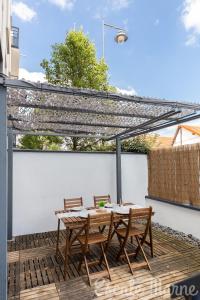 Appartements Escale-marne fr - 001 - RDC - Private Terrace - Free Parking - Free Luggage Storage - Metro 8 Eiffel Tower -All equipped - Linen Included - Washing Machine - Dish Washer - Luxury Mattress 160X200 - Panoramic View - From 1 to 4 guests : photos des chambres