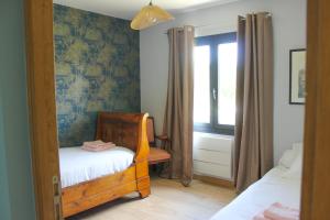 Maisons de vacances SAS Loudenne Gouache, Ecottage Walter dans le parc de Loudenne : photos des chambres