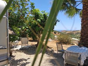 Caravan in Finca Molino in Almayate with with pool, family touch and dog madness